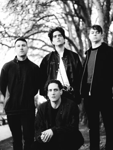 Black and white photo of the band Scattered Ashes