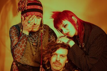 The three members of the band Adore