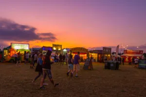 Sunset and traders by Dominic Meason