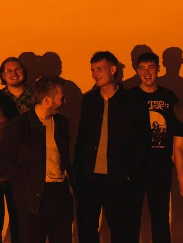 The six members of the band Adult DVD