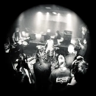 IN CONVERSATION: University 30 Black and white photo of the band university on stage