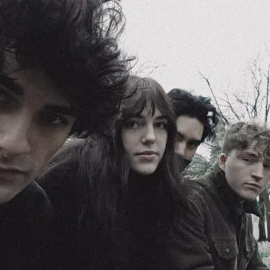 The four band members of slate