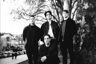 Black and white photo of the band Scattered Ashes