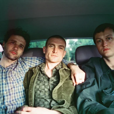 The three members of the band Cola