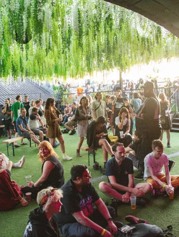 Supersonic festival goers enjoying the rooftop garden.