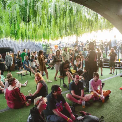 Supersonic festival goers enjoying the rooftop garden.