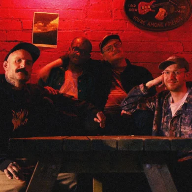 The members of the band Thank